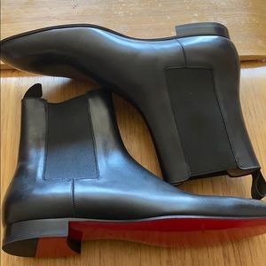 Christian Louboutin “Roadie Flat” Ankle Boots